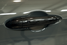 Load image into Gallery viewer, CARBON FIBER DOOR HANDLE COVERS (ALFA ROMEO GIULIA/STELVIO 2.0L & 2.9L QV)